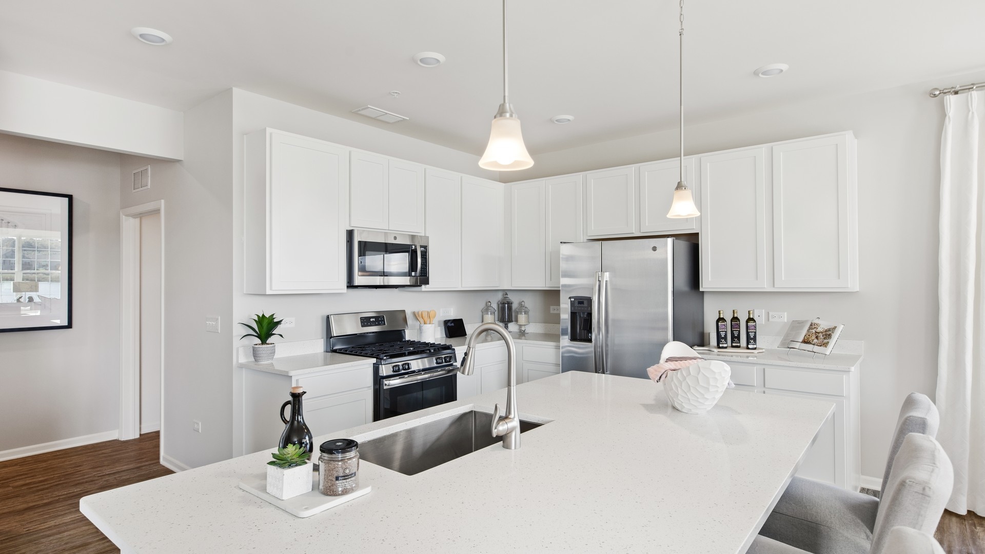Includes an oversized island with Quartz countertops