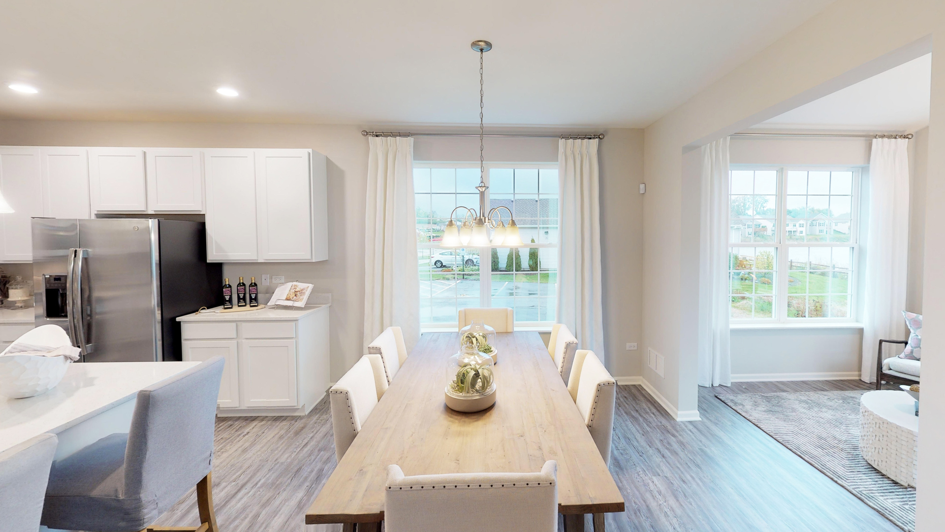 Dining room opens to a stunning sun room