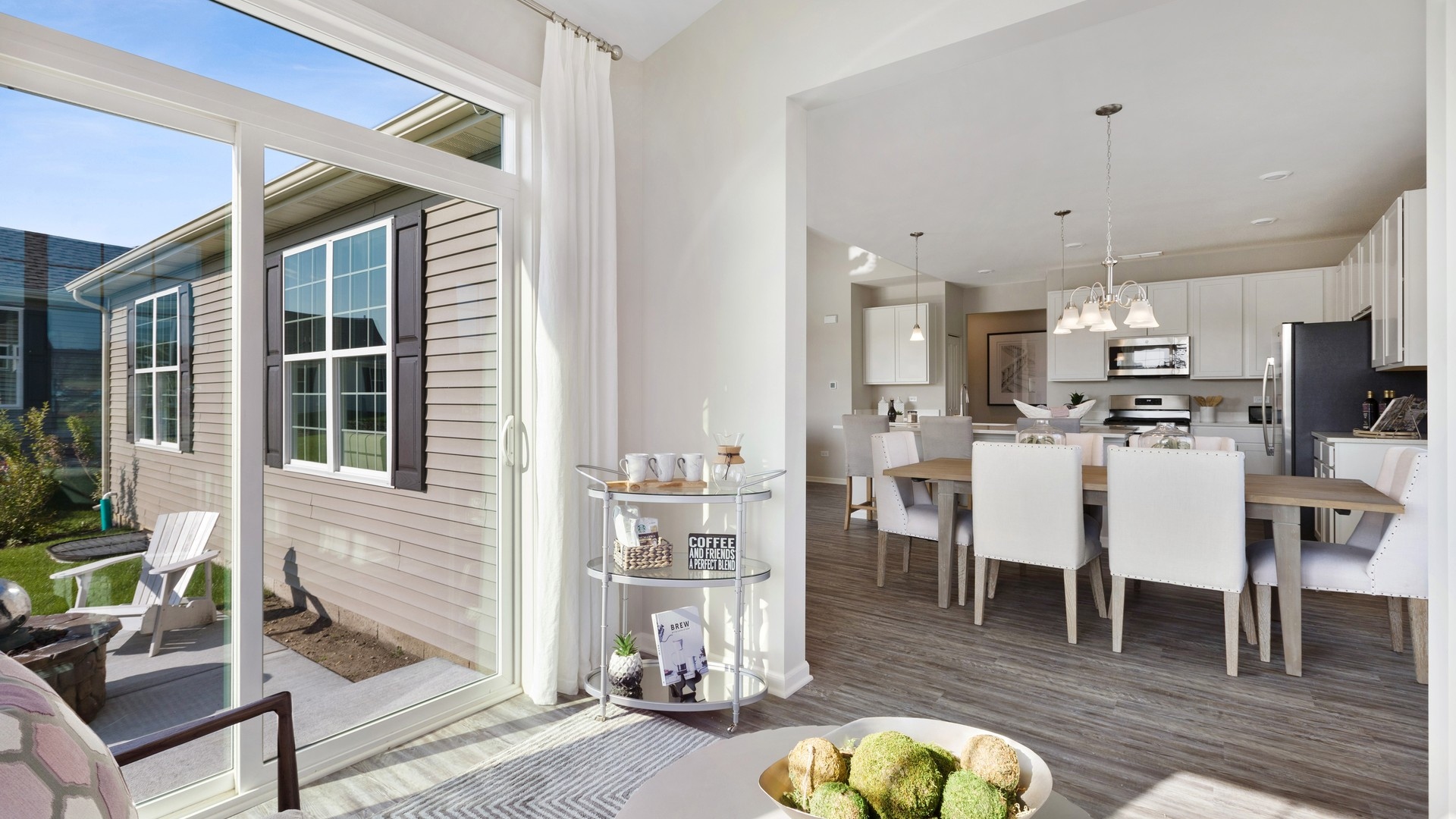 The sun room features patio access